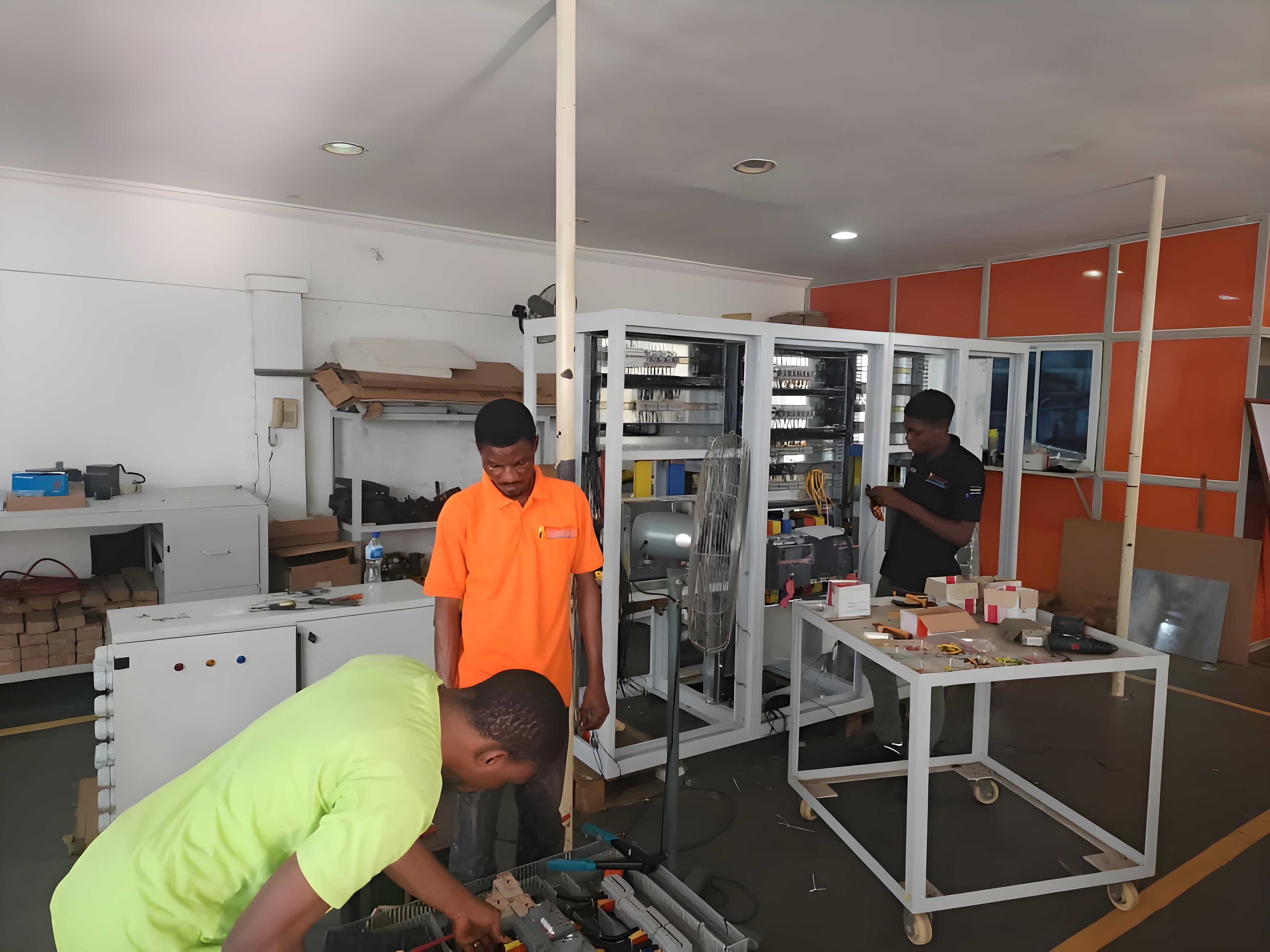 Intercom team working on electrical equipment